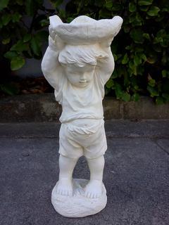 Boy holding lily pad $80
