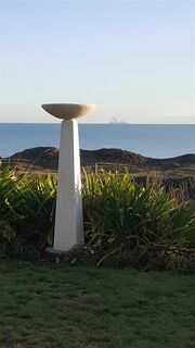Modern birdbath White Island view
